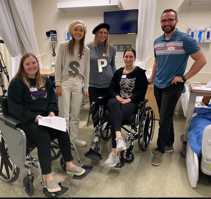 Practicing feeding positioning in wheelchair